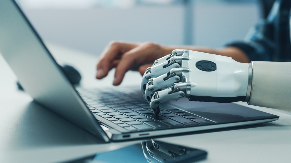 Close-up,On,Hands:,Person,With,Disability,Using,Prosthetic,Arm,To