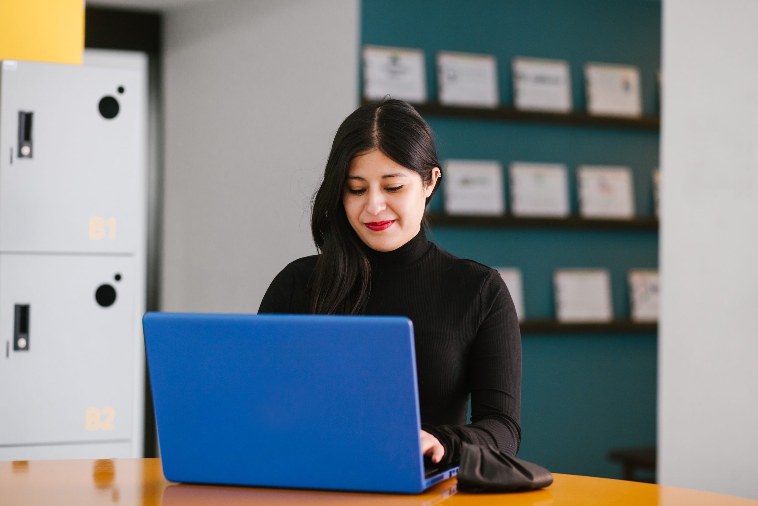 Latin,Business,Woman,Working,With,Computer,At,The,Office,In